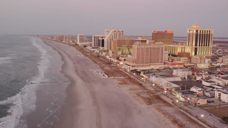 Drone-Flying-backwards-along-Atlantic-City-coast-showing-casinos