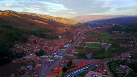 Stunning-Beauty-of-Poroy-District-in-Peru-with-an-Aerial-Drone-Shot-Showcasing-Sunlit-Hills-and-Scenic-Landscape