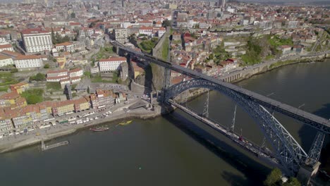 Aerial-dolly-shot-of-the-Porto-Old-Town-and-famous-Ponte-Dom-Luís-I