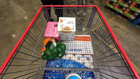 Hyperlapse-of-a-cart-being-filled-with-healthy-foods-at-Costco