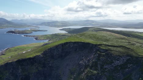 Geokaun-mountain-and-cliffs-in-valentia-island,-ireland,-showcasing-lush-landscapes-and-coastal-views,-aerial-view