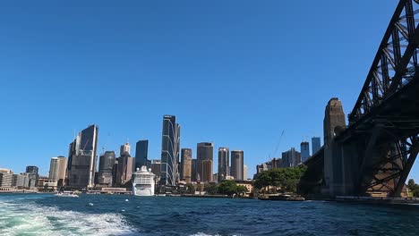 Pass-beneath-iconic-steel-arches,-treated-to-panoramic-views-Sydney-Harbour