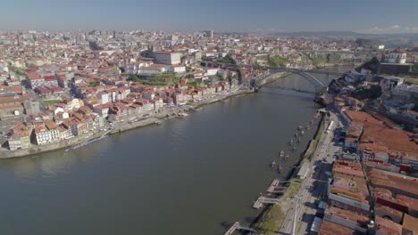 Aerial-dolly-shot-with-a-stunning-panorama-of-the-Porto-Old-Town-with-Ponte-Dom-Luís-I-bridge-over-the-Douro-River