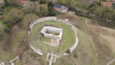 Aerial-Approach-Drone-View-of-Bailey-Gate-at-Castle-Acre,-Norfolk,-England