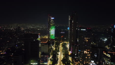 Aerial-view-in-front-of-the-Torre-BBVA-Mexico-in-New-Years-light-show-colors