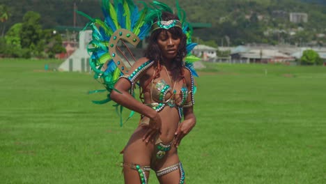 On-Trinidad's-enchanting-island,-a-young-girl-embraces-the-carnival-spirit-with-her-exuberant-costume