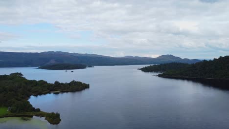 Ariel-Drone-View-of-Island-in-Loch-Lomond-on-Cloudy-Day