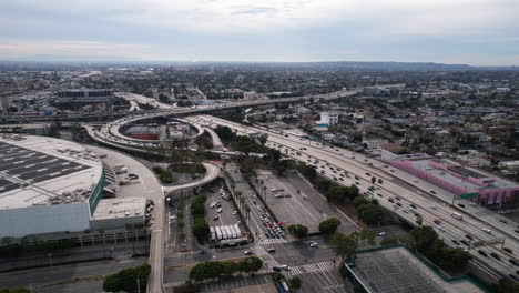 Aerial-View-of-Interchange-Traffic-in-Downtown-Los-Angeles-USA-Area,-Harbor-and-Santa-Monica-Freeway-Junction-and-Beltway