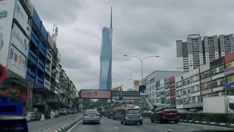 Driving-view-of-Kuala-Lumpur-with-Merdeka-Tower-in-sight