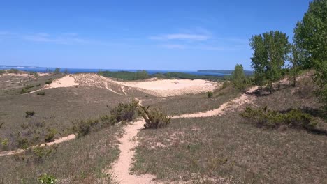 Popular-Sleeping-Bear-Dune-near-one-of-the-Great-Lakes-on-sunny-day