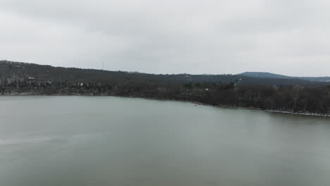Establishing-aerial-panning-shot-of-Lake-Sequoyah-on-a-winter-rainy-day