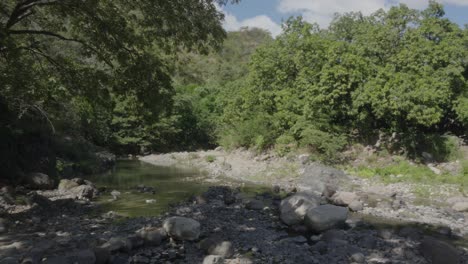 Landscape-of-a-stream-affected-by-drought-in-the-middle-of-the-forest-in-southern-Honduras