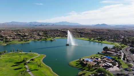 Panoramic-aerial-orbit-around-Fountain-Hills-Arizona-community-by-golf-course