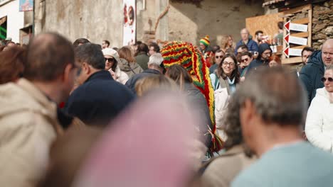 Caretos-mingle-at-Podence-Carnival,-Portugal