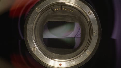Macro-view-close-up-of-camera-lens-adaptor-with-camera-moving-forward