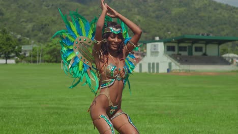 In-the-midst-of-Trinidad's-lively-carnival-celebrations,-a-young-girl-shines-brightly-in-her-vibrant-costume