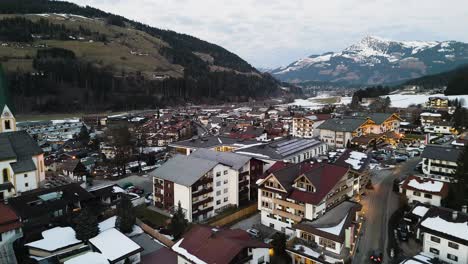 Panoramic-aerial-view-of-Kirchberg-village-in-mountains-of-Austria,-winter-seasons