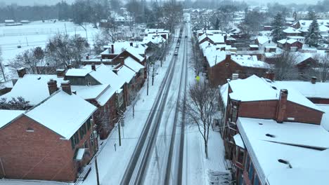 Historic-town-street-covered-in-snow-during-flurries