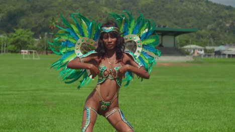 Amidst-the-pulsating-rhythms-of-Trinidad's-carnival-music,-a-young-girl's-spirit-shines-through-in-her-colorful-attire