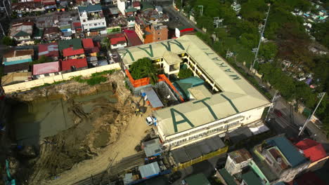 Aerial-view-around-the-Francisco-Benitez-Elementary-School,-in-Makati,-Philippines