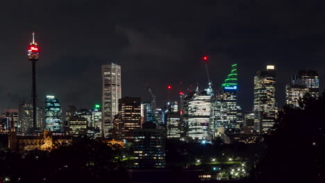 Night-timelapse-of-Sydney-Tower,-lights-of-downtown-Sydney,-Australia