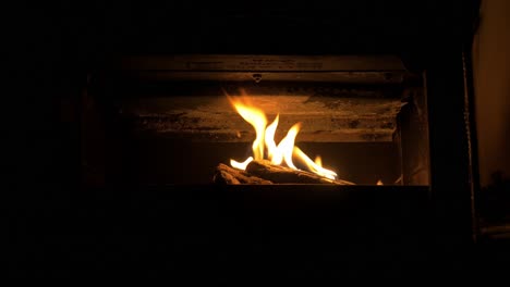 cozy-flames-in-fireplace-dolly-slide-to-close-up-cinematic