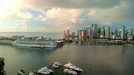 Aerial-drone-shot-of-Miami-skyline-in-the-morning-day-4k-with-cruise-ship