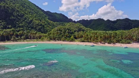 Drone-view-over-scenic-Caribbean-coral-reef-and-pristine-beach-of-Playa-Ermitano