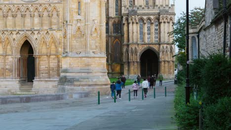 Views-of-the-famous-landmark-Lincoln-Cathedral-showing-sightseers-and-shoppers-walking-along-the-busy-streets-in-the-historic-town-of-Lincoln