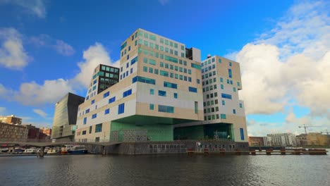 Fixed-wide-exterior-of-Court-of-Justice-institute-in-Amsterdam-on-sunny-day