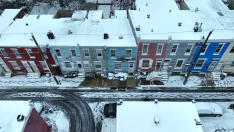 Rundown-urban-housing-covered-in-snow-during-winter-in-USA-city