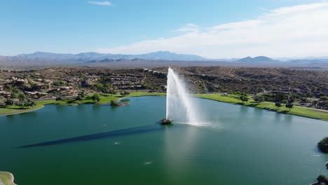 Lake-at-center-in-middle-of-Fountain-Hills-with-panoramic-mountain-backdrop-in-Arizona