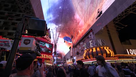 Crowd-Of-People-At-Fremont-Street-Experience-With-Neon-Lights-On-In-Downtown-Las-Vegas,-Nevada