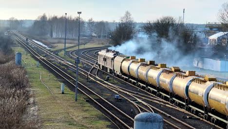 Internal-combustion-Locomotive-engine-on-rail-thick-pollution-smoke