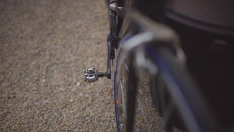 Closeup-shot-of-pedal-of-a-mountain-bike-with-blurred-foreground