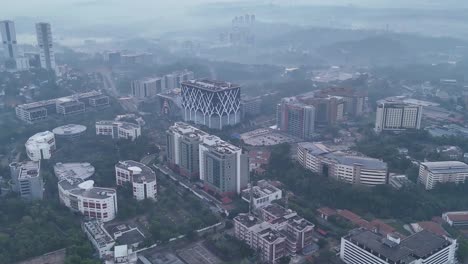 Aerial-view-of-ernakulam-city-building-early-morning-misty-hills