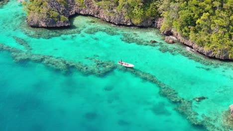 Village-locals-spear-fishing-in-hidden-lagoon