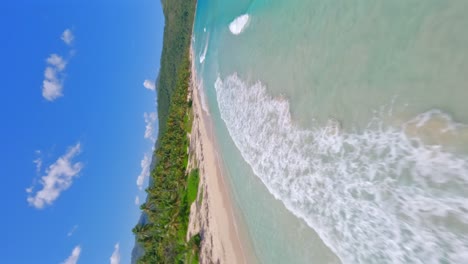 Crazy-drone-flying-over-turquoise-ocean-waters-of-Playa-Rincon-beach-in-Dominican-Republic