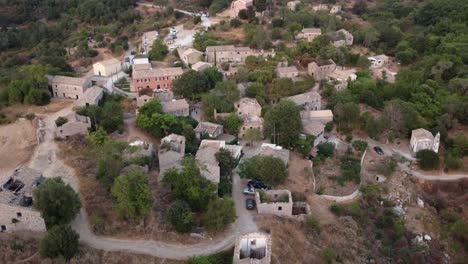 Aerial-Tilt-over-Old-Perithia-Village,-Corfu,-Greece