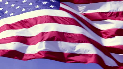 Closeup-of-Stars-and-Stripes-on-American-flag-flying-in-wind