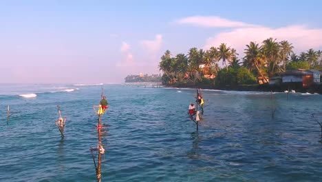 Aerial-Over-Stilt-Fisherman-In-Waters-Off-Ahangama-In-Sri-Lanka