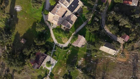 Aerial-top-view-of-Solar-Paneled-Roof-on-Rural-Estate