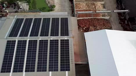 4k-Aerial-of-Warehouse-Solar-Rooftop,-Drone