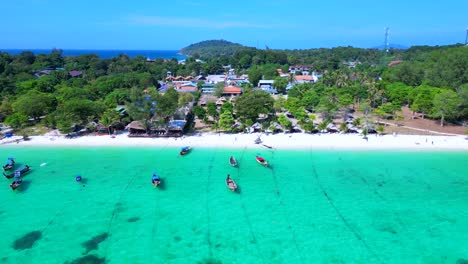 dream-beach-longtail-boats-in-turquoise-water