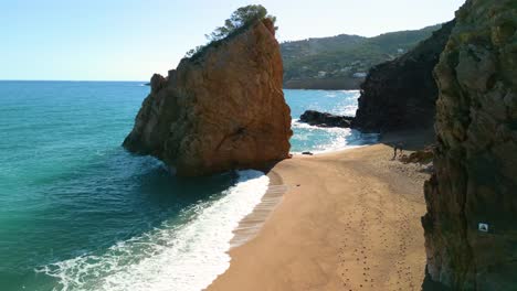 Ilia-Roja-beach-on-the-Costa-Brava-of-Gerona,-rock-in-the-middle-of-the-sea-nudist-beach-,-Nature-nudist