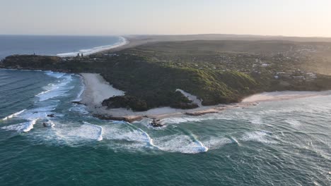 Orbiting-Drone-shot-of-Stradbroke-Islands-Point-Lookout-North-Gorge