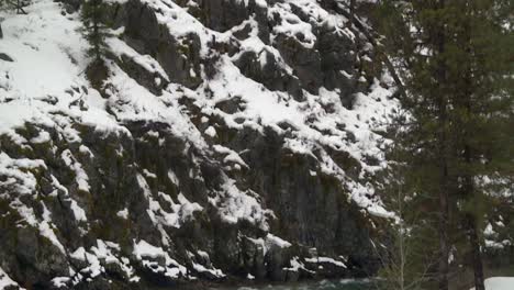 Flowing-River-Through-Snowy-Terrain-At-Boise-National-Forest-In-Boise,-Idaho-In-Winter