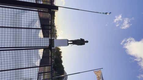 Statue-of-General-Jose-de-San-Martin-in-Ushuaia-during-sunset-against-blue-skies