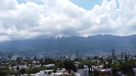 Drone-footage-of-a-drone-in-monterrey,-with-views-of-Sierra-Madre-in-San-Pedro