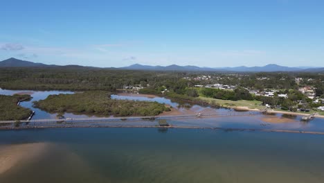 Urunga-boardwalk-aerial-views-inland-past-Urunga-town-and-up-the-river-valleys-to-the-Great-Dividing-Range